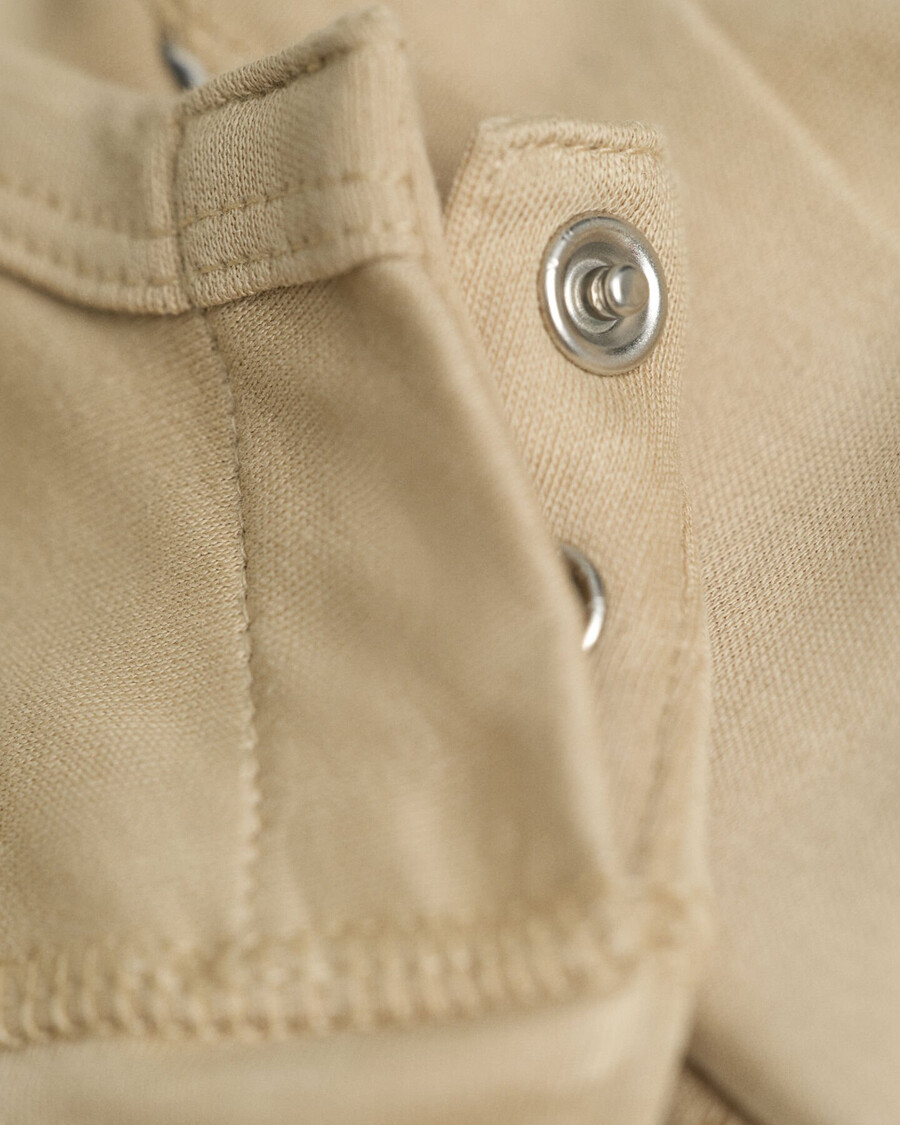 babybody und mütze mit hundeprint – dunkelkhaki