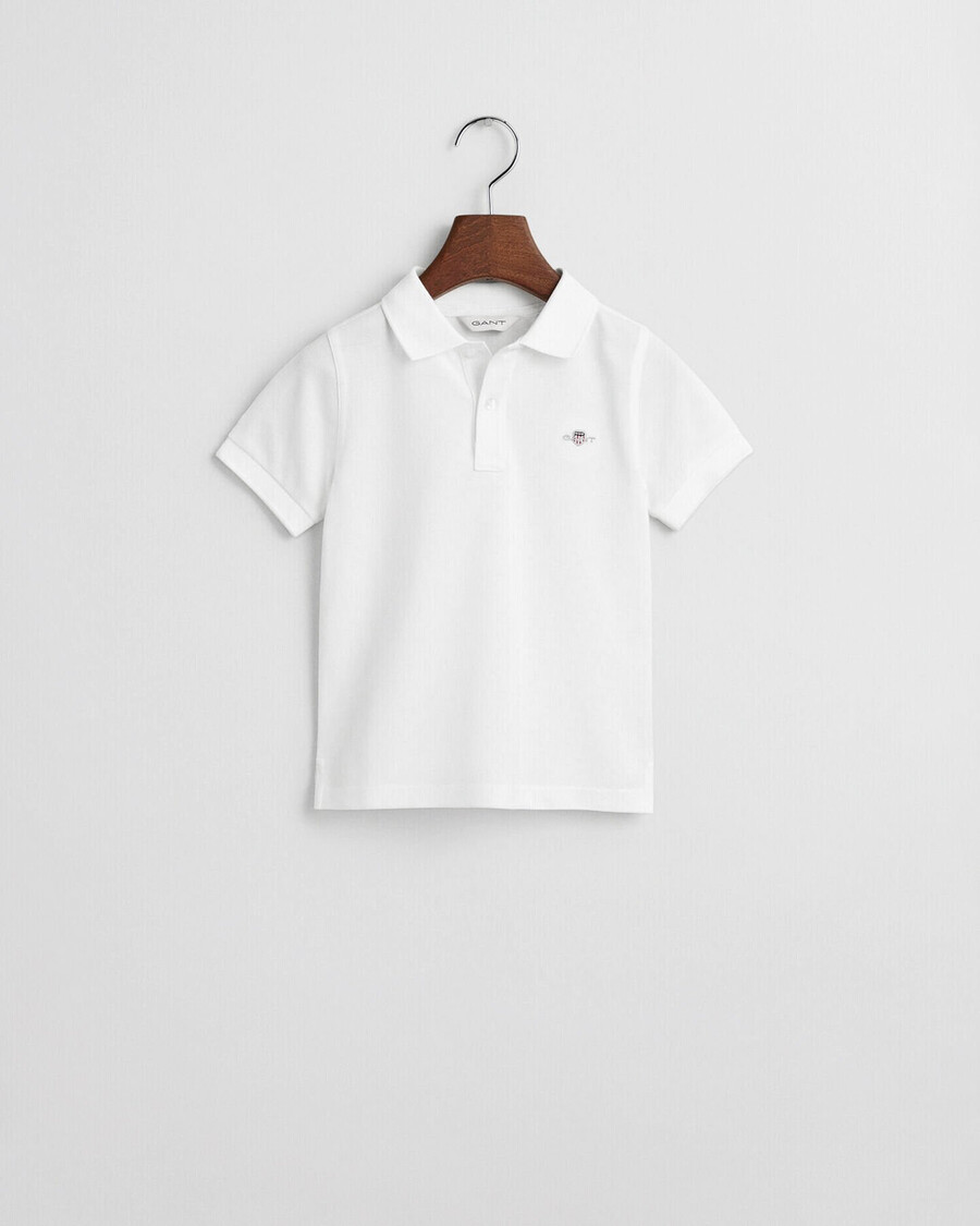 kinder-piqué-poloshirt mit schildmuster – weiß