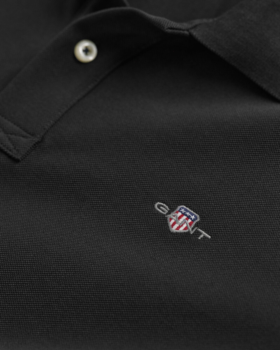 shield piqué rugger - schwarz