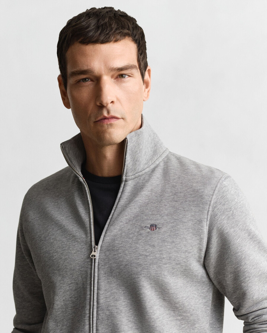 sweatshirt mit reißverschluss und schildmuster – graumeliert