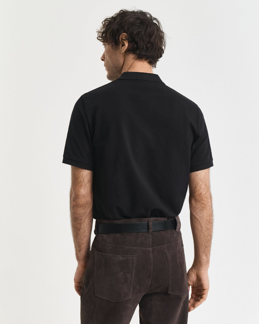 poloshirt mit kleinem grafikprint – schwarz