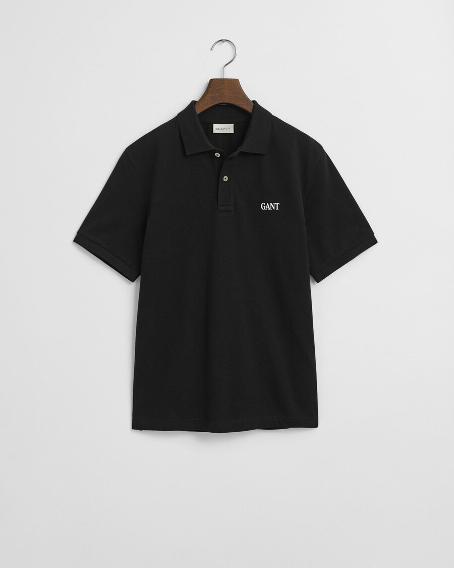 poloshirt mit kleinem grafikprint – schwarz