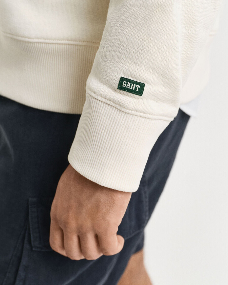 sweatshirt mit grafikprint und rundhalsausschnitt – creme