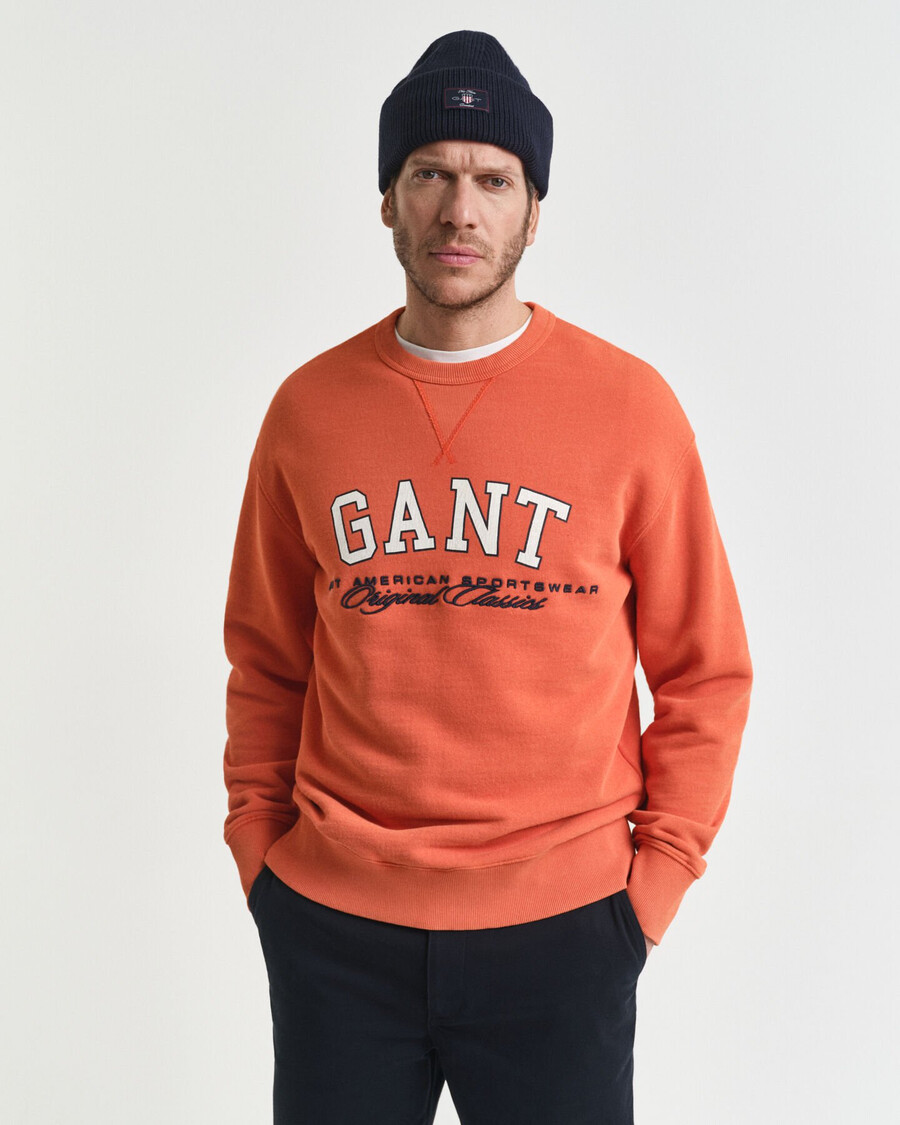 college-sweatshirt mit grafikprint und rundhalsausschnitt – dunkelorange