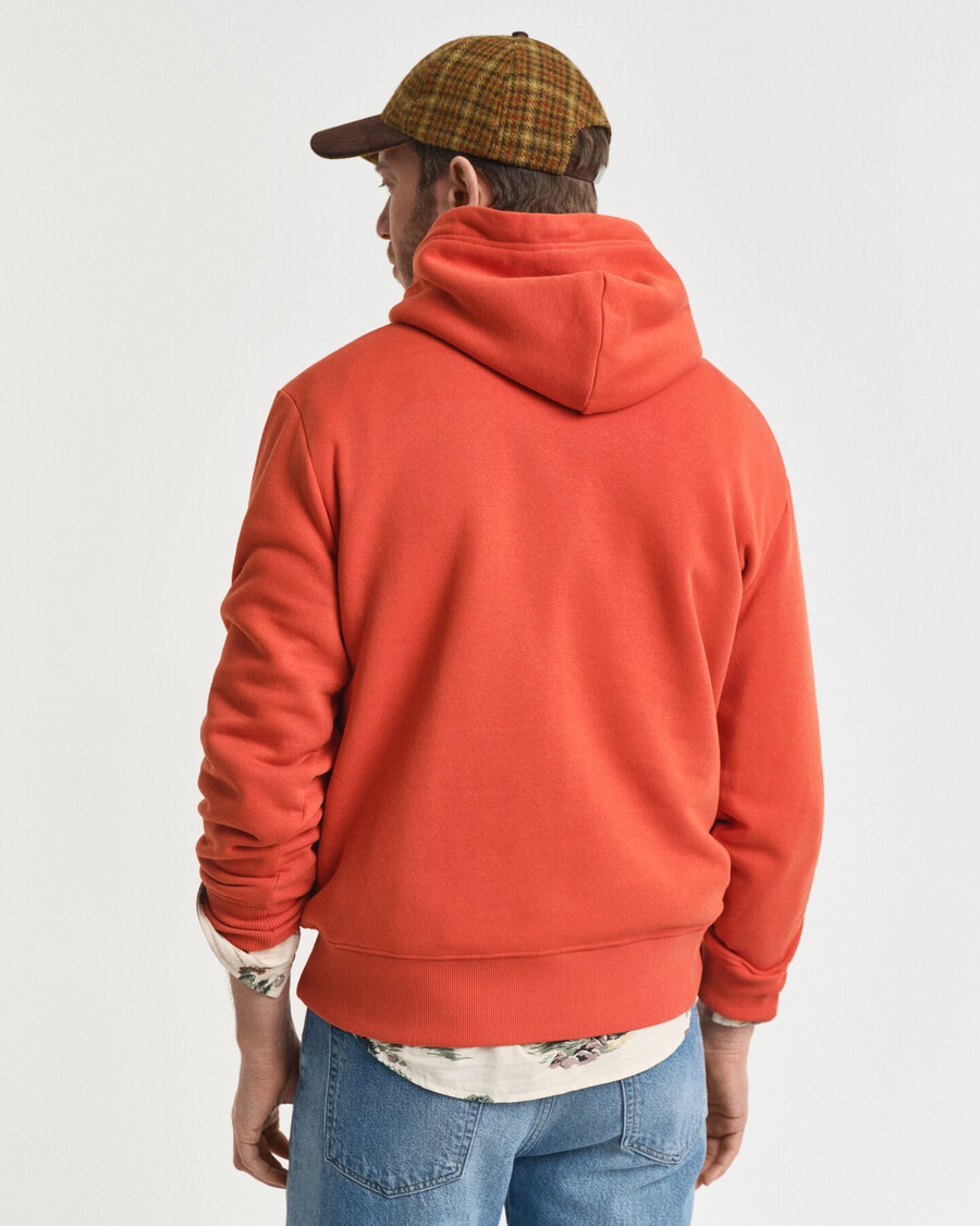 kapuzenpullover mit wappengrafik – tieforange