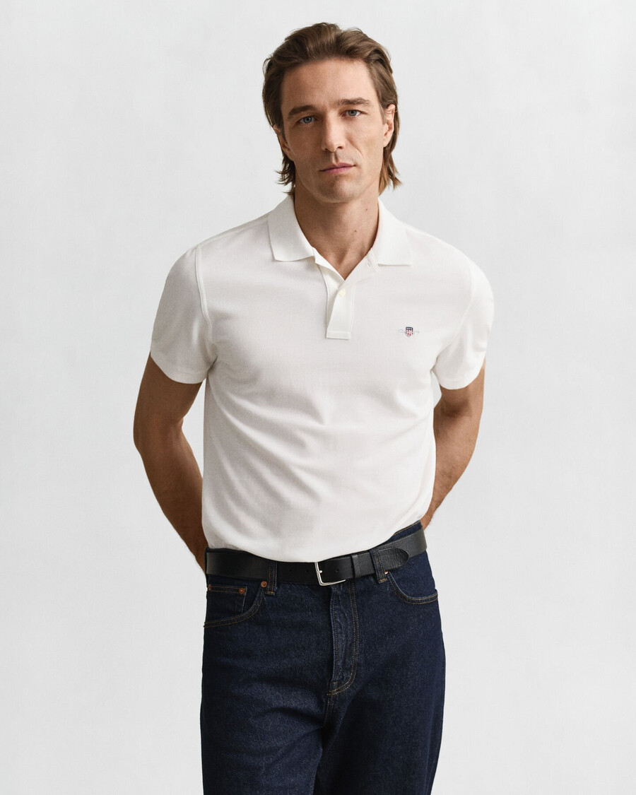 poloshirt aus piqué-leder mit regulärer passform – weiß