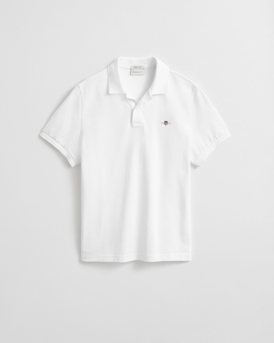 poloshirt aus piqué-leder mit regulärer passform – weiß