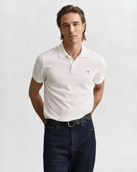 poloshirt aus piqué-leder mit regulärer passform – weiß