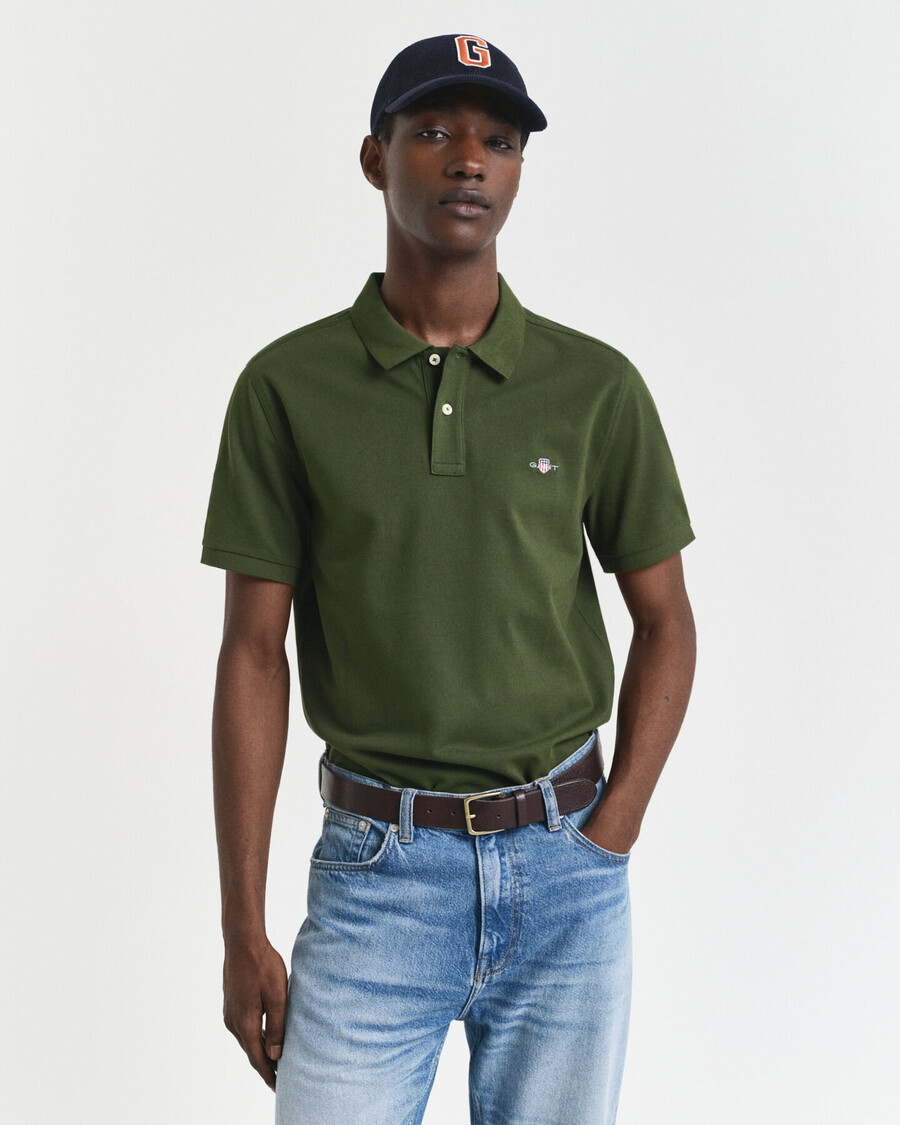 poloshirt aus piqué-leder mit regulärer passform – country green