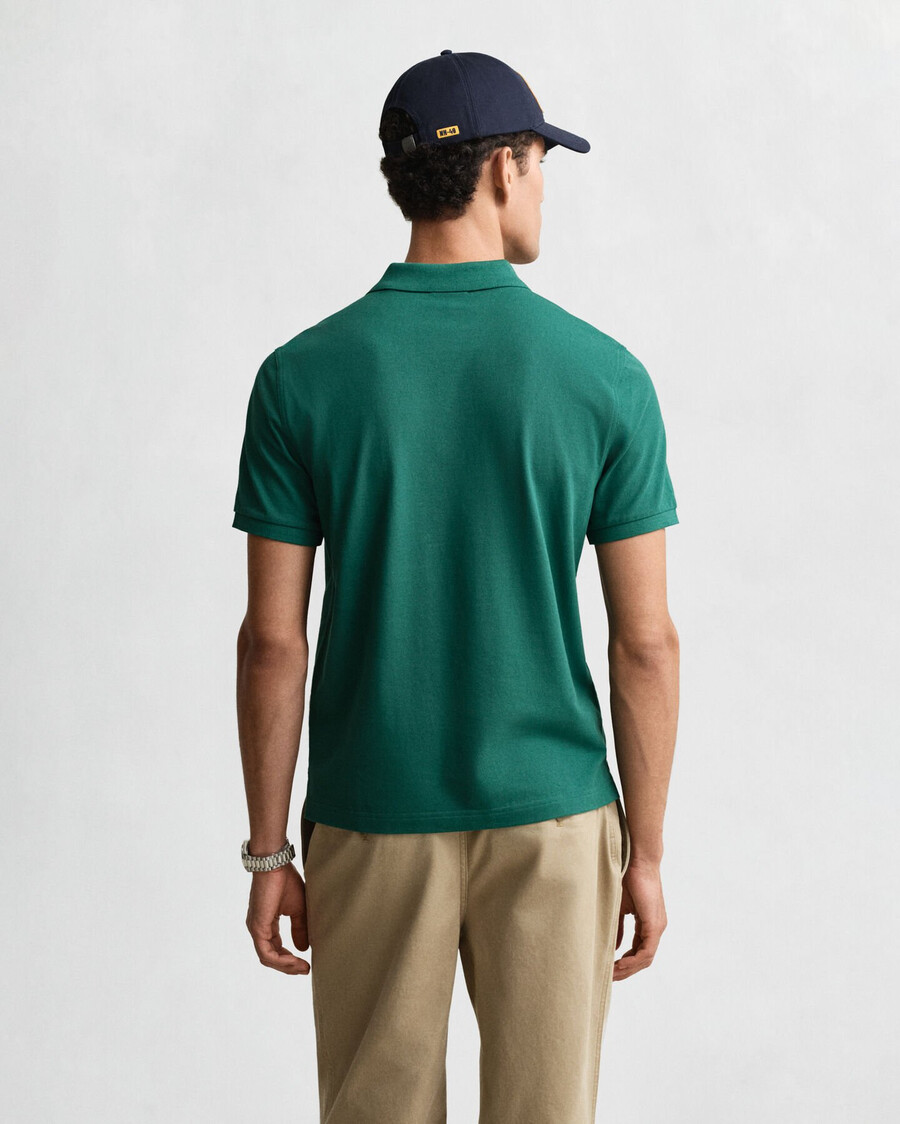 poloshirt aus piqué mit regulärer passform – dunkelwaldgrün