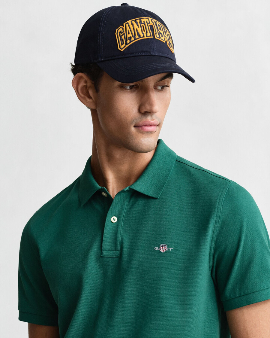 poloshirt aus piqué mit regulärer passform – dunkelwaldgrün