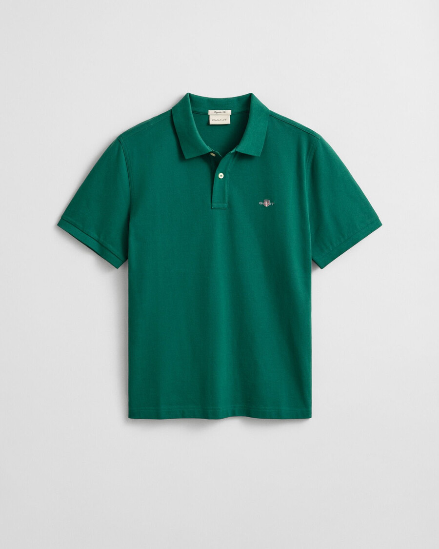 poloshirt aus piqué mit regulärer passform – dunkelwaldgrün