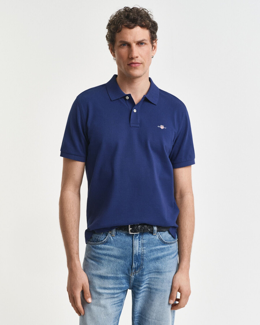 poloshirt aus piqué-leder mit regulärer passform – persischblau