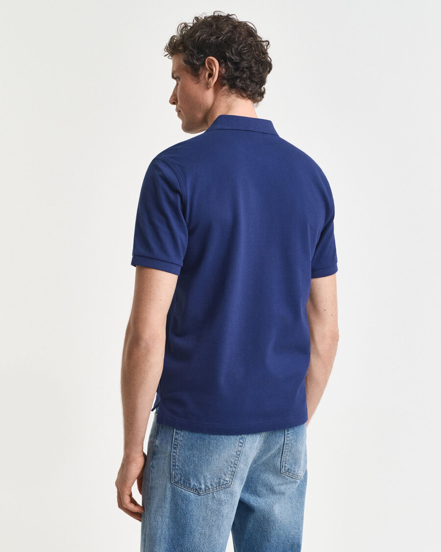 poloshirt aus piqué-leder mit regulärer passform – persischblau