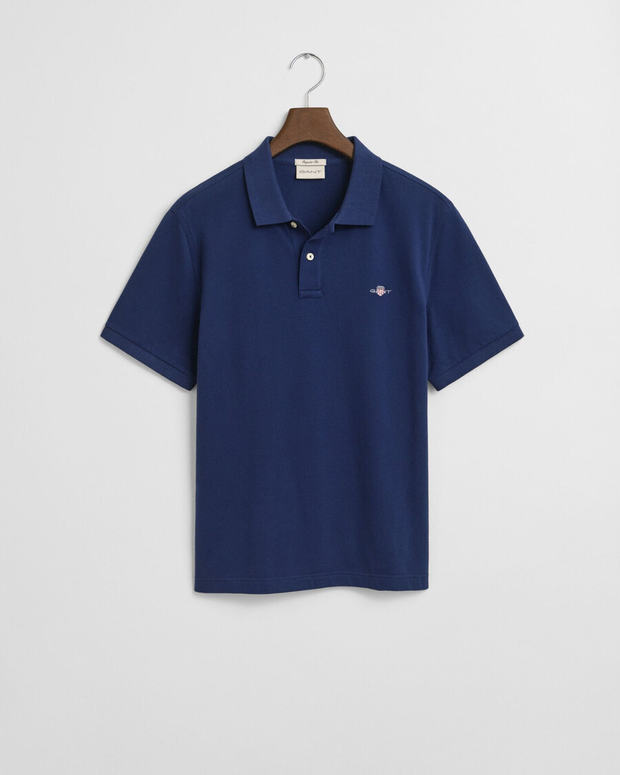 poloshirt aus piqué-leder mit regulärer passform – persischblau