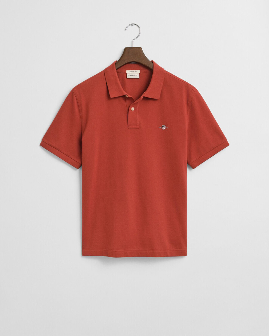 poloshirt aus piqué mit regulärer passform – modern rust