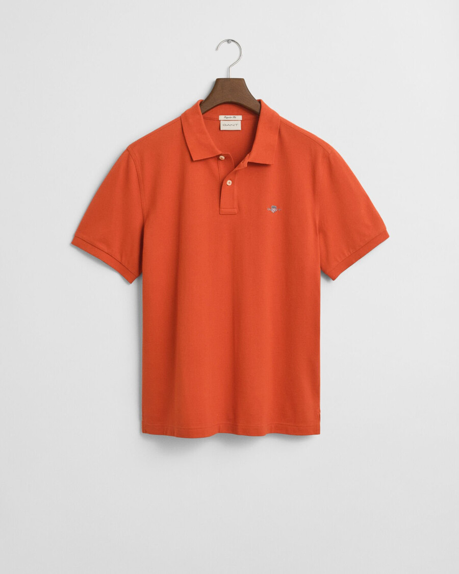 poloshirt aus piqué mit regulärer passform – tiefes orange