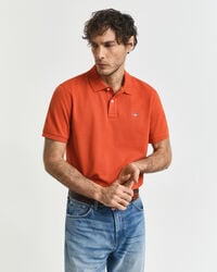 poloshirt aus piqué mit regulärer passform – tiefes orange