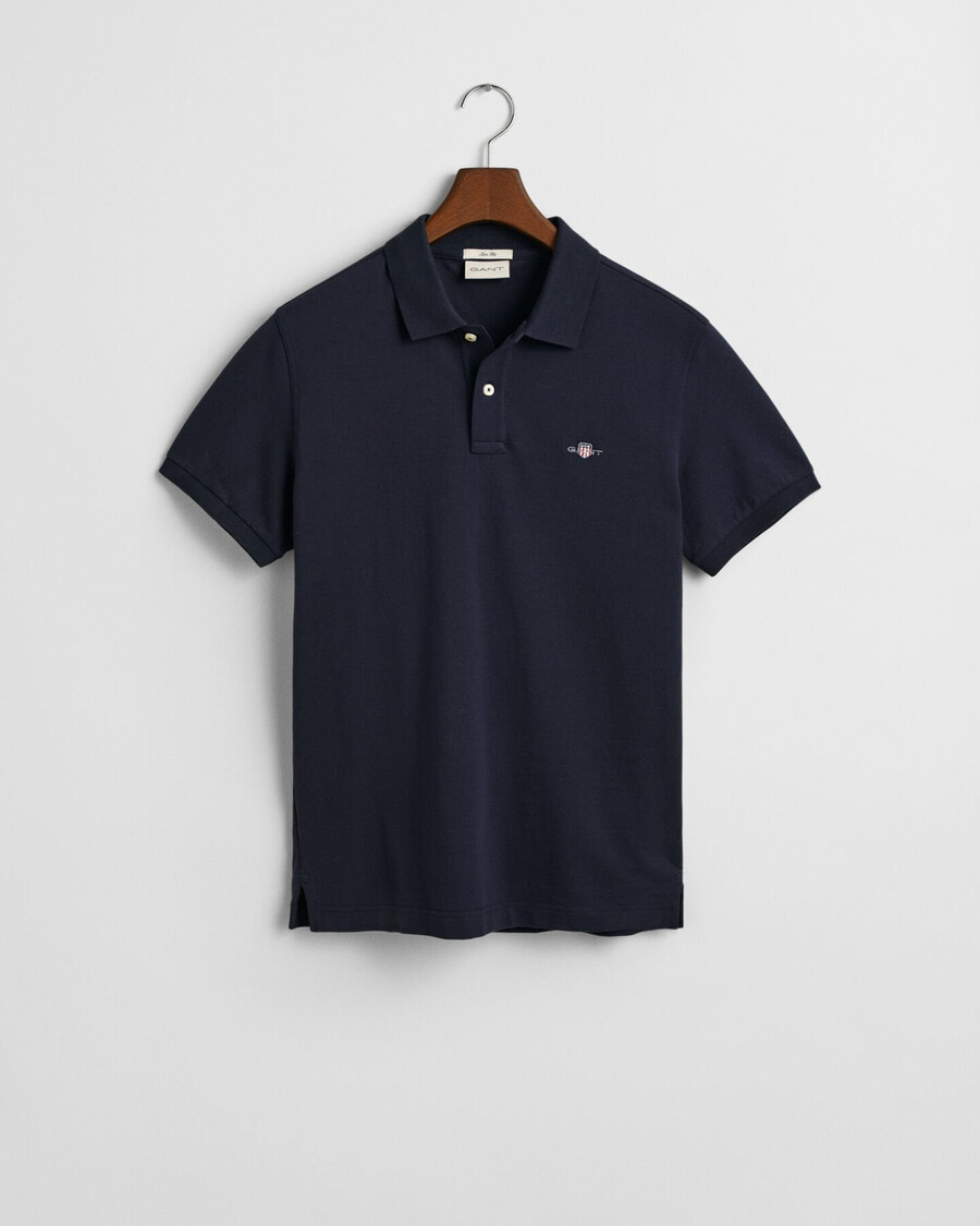 schmal geschnittenes poloshirt aus piqué mit schildmuster – abendblau