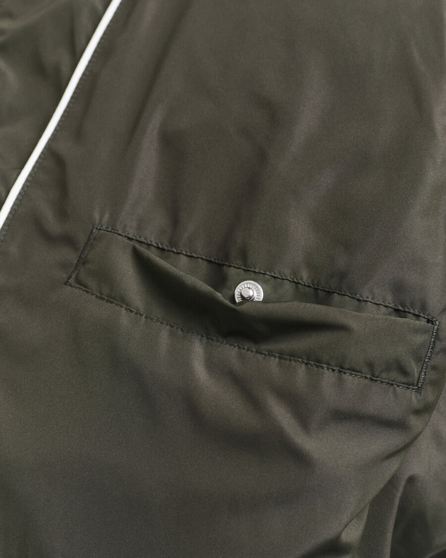 gesteppte windjacke in mittlerer länge – dunkelmoosgrün