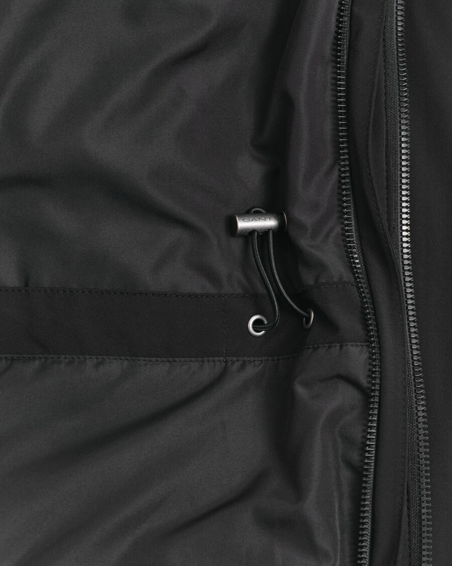 doppelte mittellange jacke - schwarz