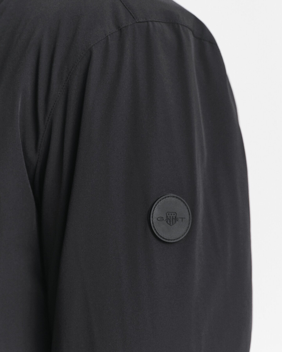 doppelte mittellange jacke - schwarz