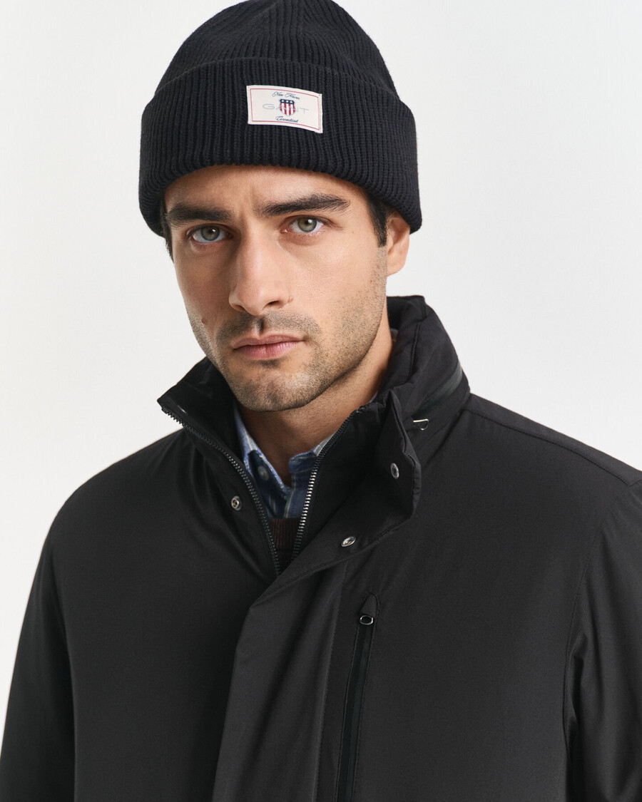doppelte mittellange jacke - schwarz
