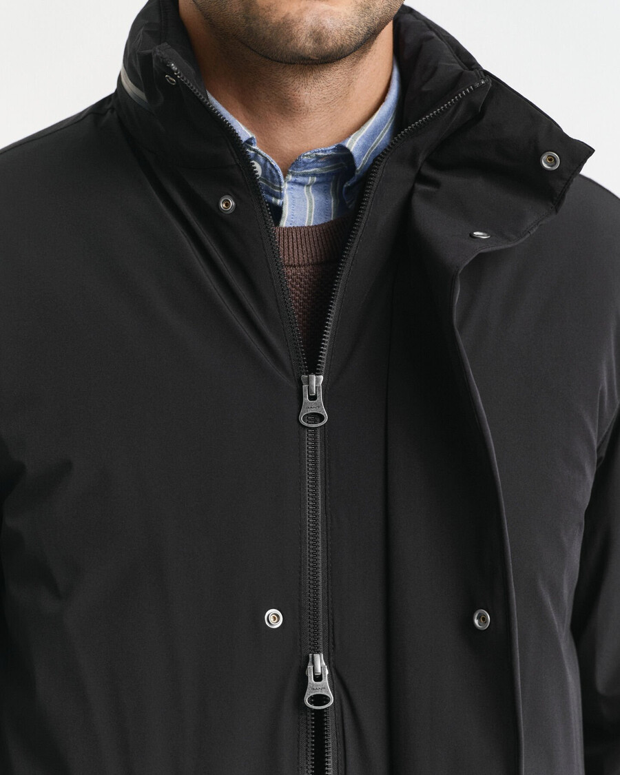 doppelte mittellange jacke - schwarz