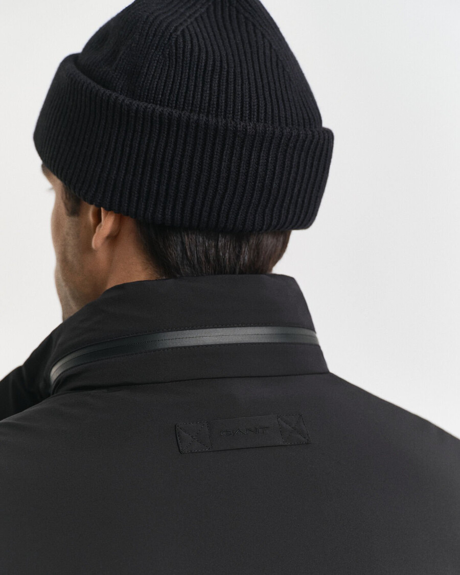 doppelte mittellange jacke - schwarz