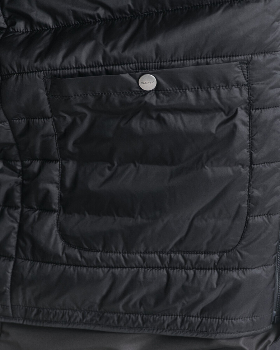 doppelte mittellange jacke - schwarz