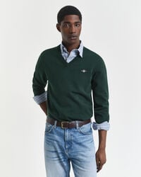 klassischer baumwollpullover mit v-ausschnitt – tartangrün