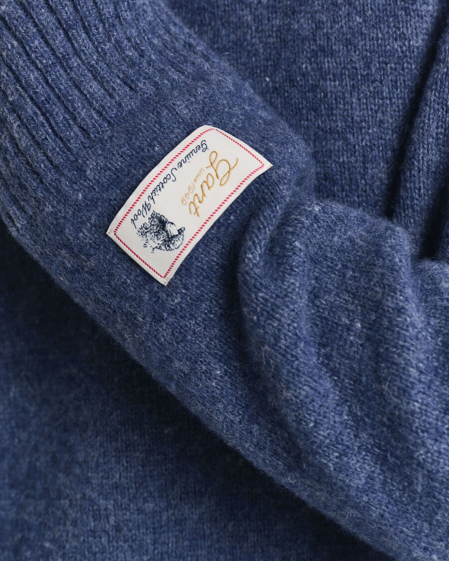 schottischer wollpullover mit rundhalsausschnitt – marine melange