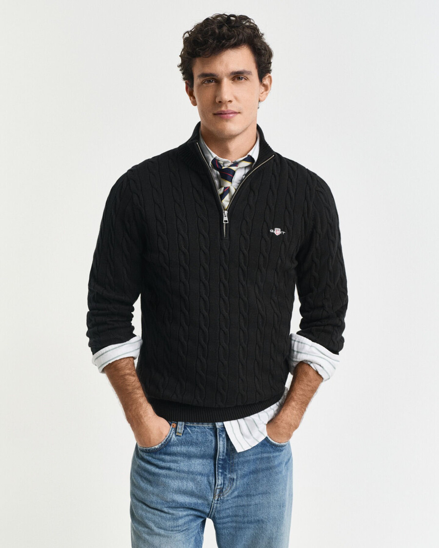 schwarzer baumwoll-pullover mit zopfmuster und halbem reißverschluss