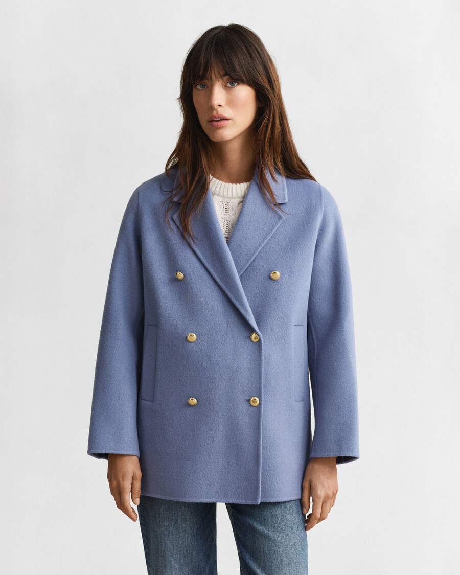 pea coat mit handgenähten details – verwaschener denim