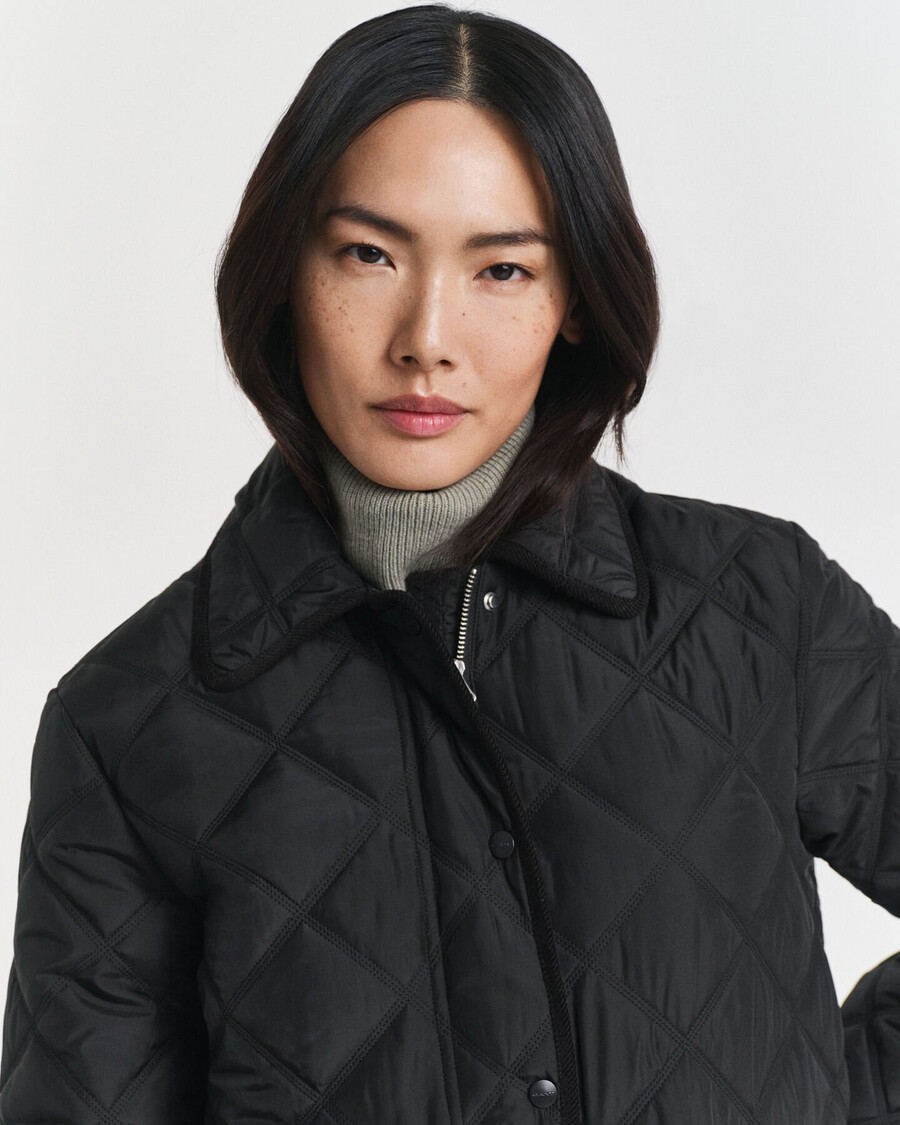 gesteppte jacke mit cordbesatz – schwarz