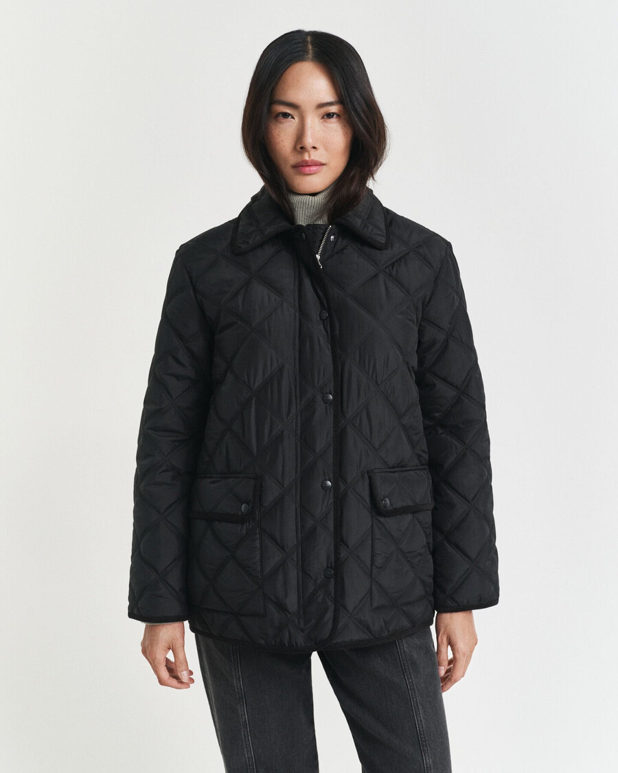 gesteppte jacke mit cordbesatz – schwarz