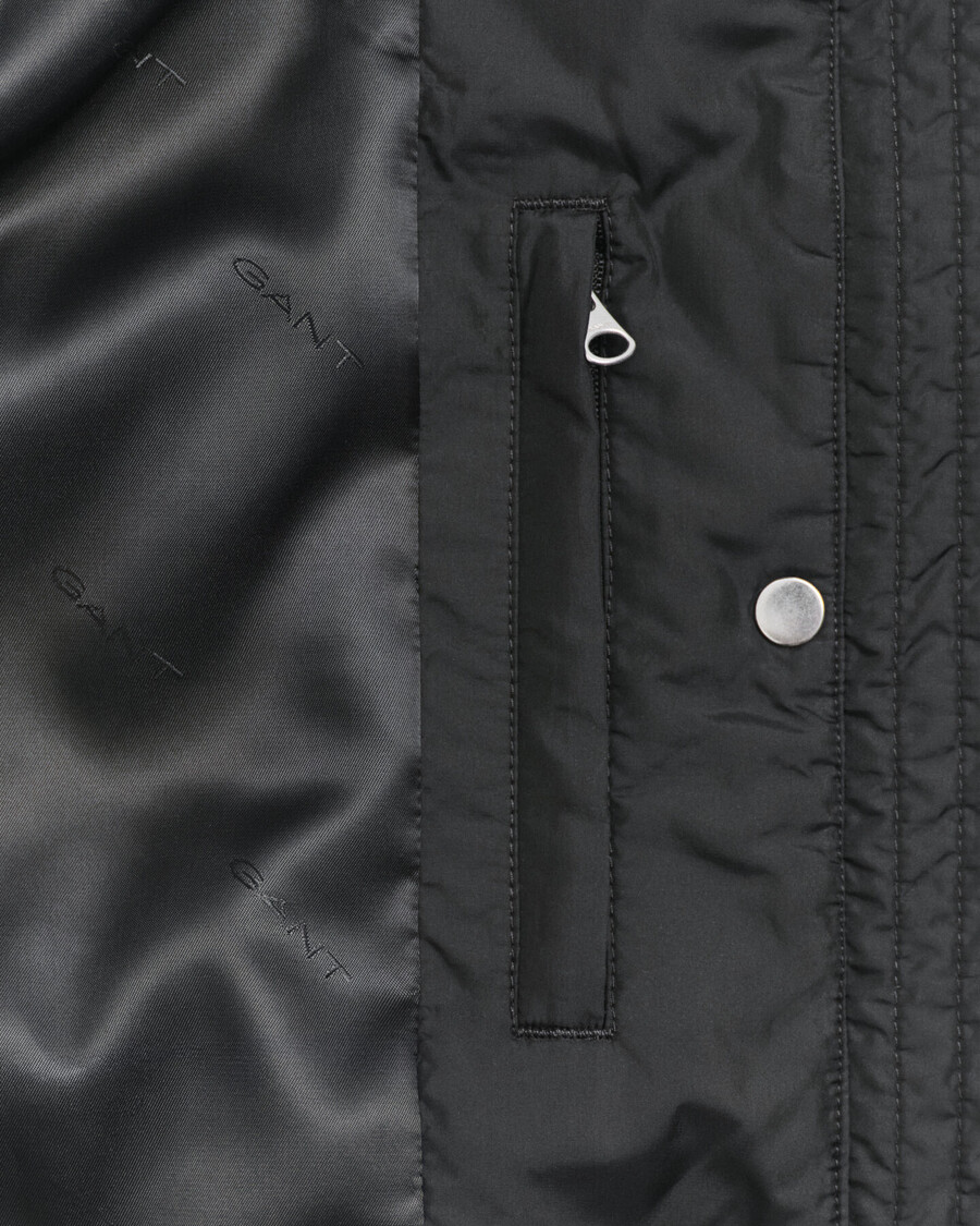 gesteppte jacke mit cordbesatz – schwarz