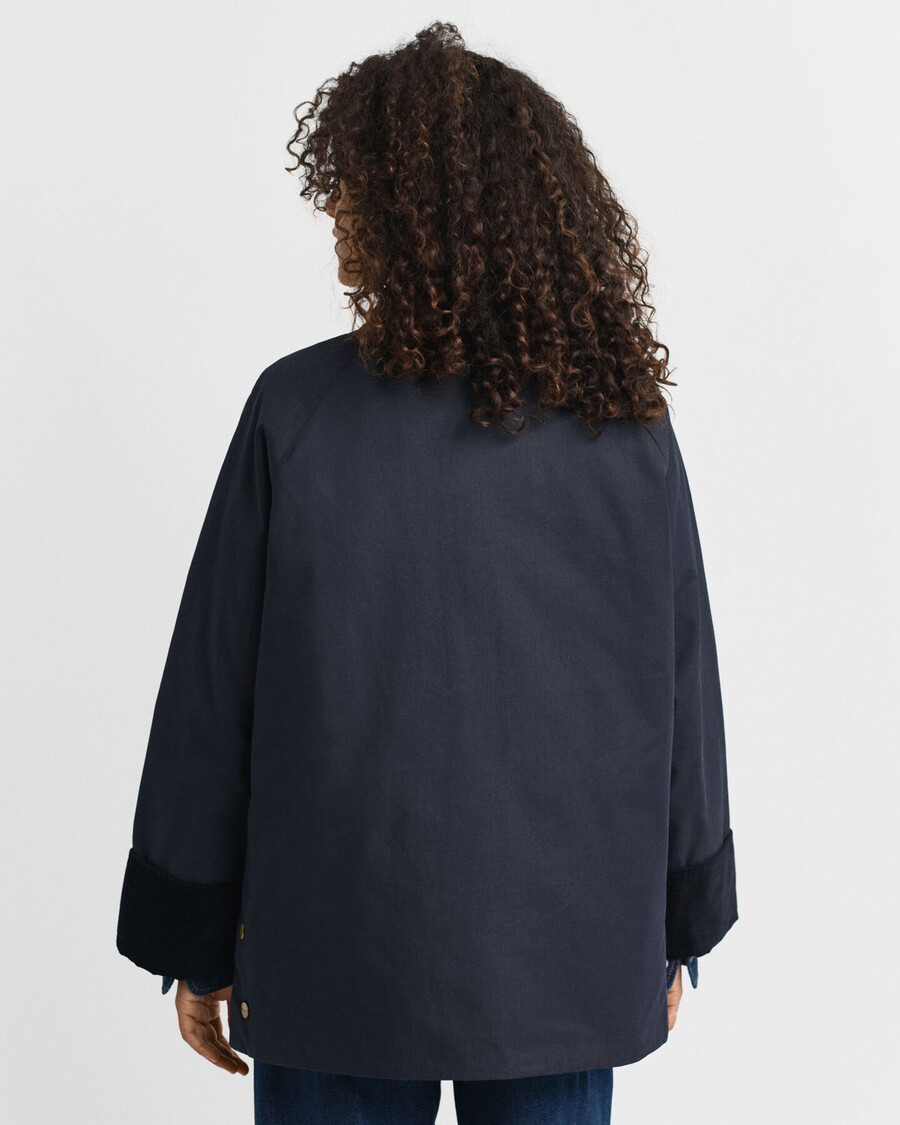doppeldeckerjacke aus gewachster baumwolle – abendblau